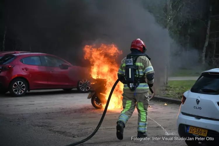 Scooter in brand Loosdrechtse bos